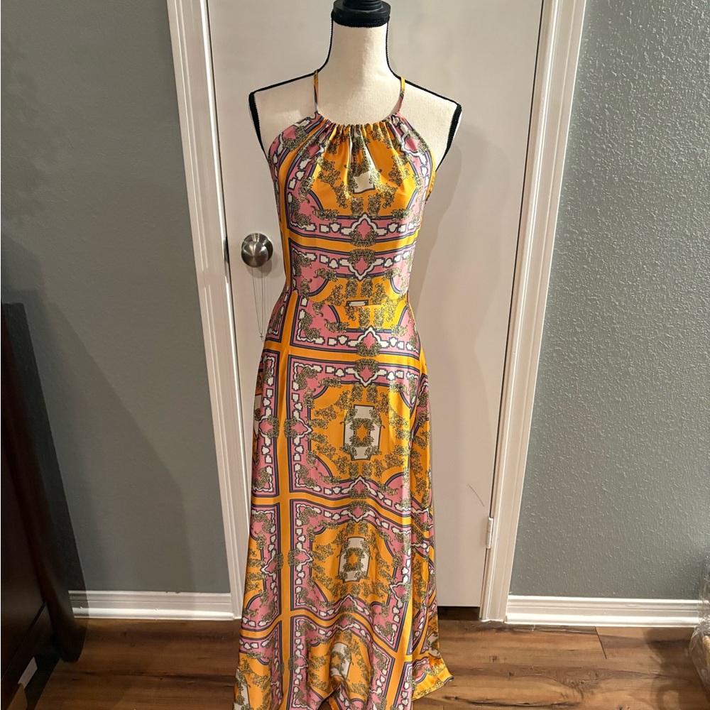 Greek print, maxi dress with halter/criss-crossed straps.